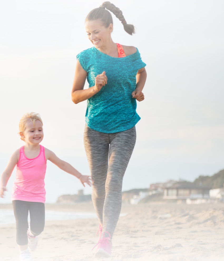 Mother and daughter running
